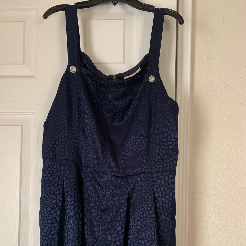 Blue satin romper with cute buttons